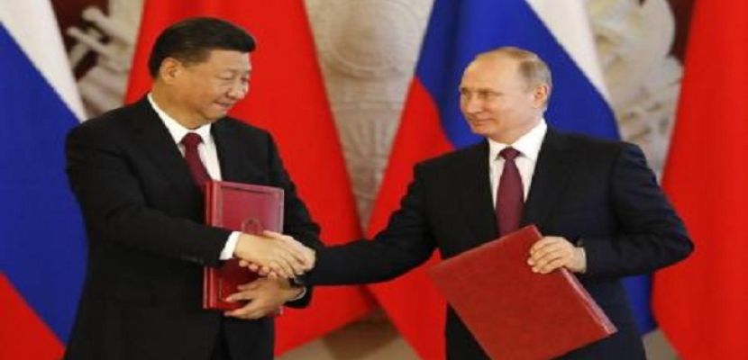 مجلة “تايم الأمريكية”: العقوبات علي روسيا قد تؤدي إلي تعزيز علاقتها مع الصين