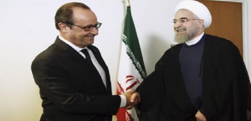 هولاند: إيران يمكنها تسهيل التوصل لحل سياسي في سوريا