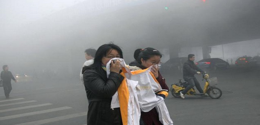 الضباب الدخانى يخنق بكين مع بدء محادثات المناخ فى باريس اليوم