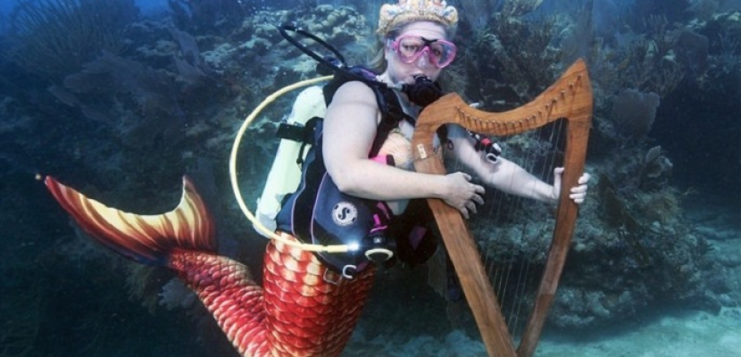 بالصور.. حفل موسيقي تحت الماء للحث على حماية الشعاب المرجانية
