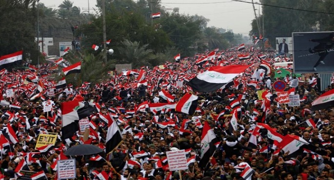 العراقيون ينظمون مسيرة شعارها “كلا كلا أمريكا” ضد الوجود العسكري الأمريكي
