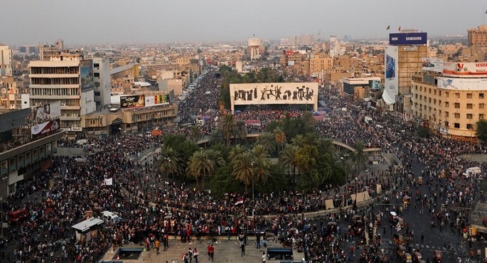 الأمن العراقى يحاول فض اعتصام ساحة التحرير .. ومواجهات عنيفة مع المتظاهرين