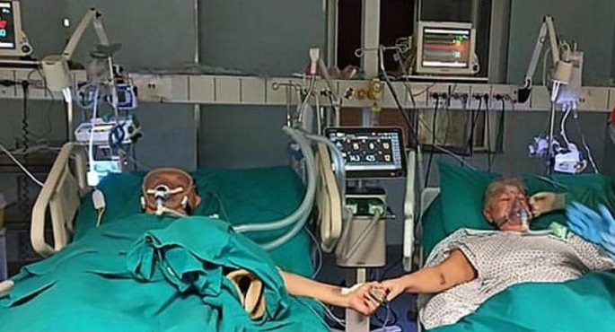 زوجان مصابان بالفيروس يحتفلان بعيد زواجهما الـ 50 بالمستشفى
