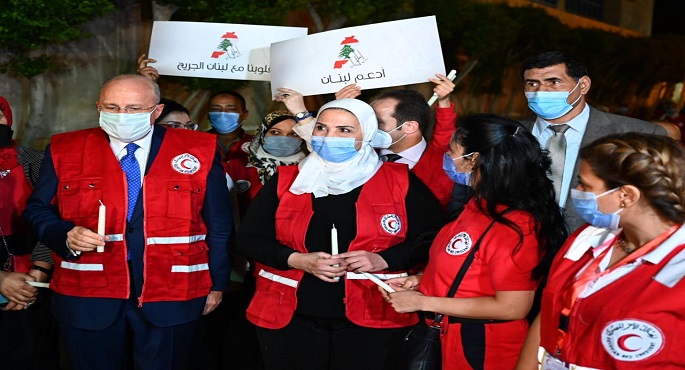بالصور.. وزيرة التضامن تتقدم مسيرة الهلال الأحمر لتأبين ضحايا مرفأ بيروت