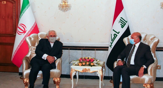 بالصور .. ظريف يصل بغداد ويلتقي نظيره العراقي ويزور مكان اغتيال سليماني