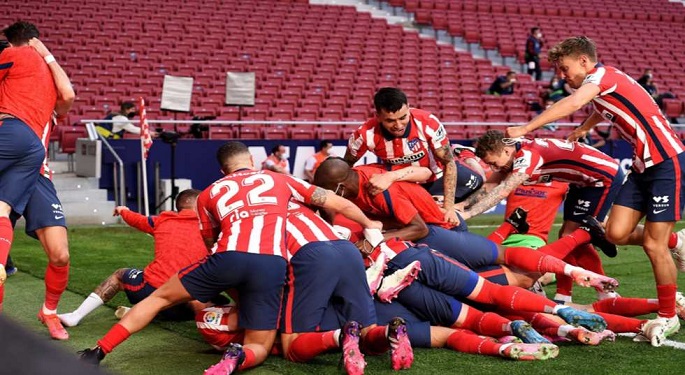 أتلتيكو مدريد ينتزع فوزا قاتلا من أوساسونا ويقترب من لقب الدوري الإسباني