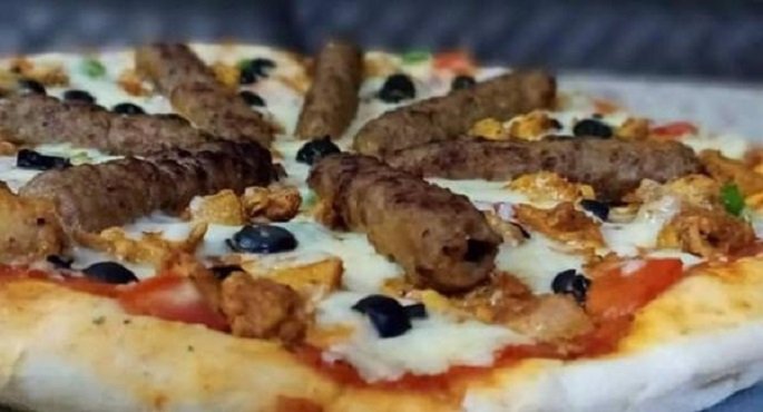 مجرمون في سجن بالسويد يختطفون رهائن من أجل 20 بيتزا كباب !!
