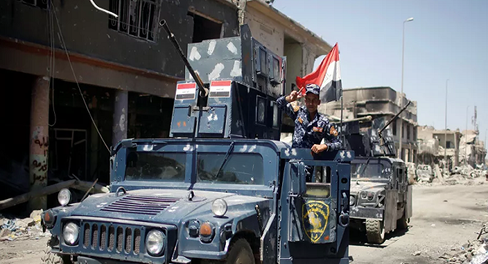 العراق يعلن خطة لمنع استهداف مطار بغداد والمنطقة الخضراء
