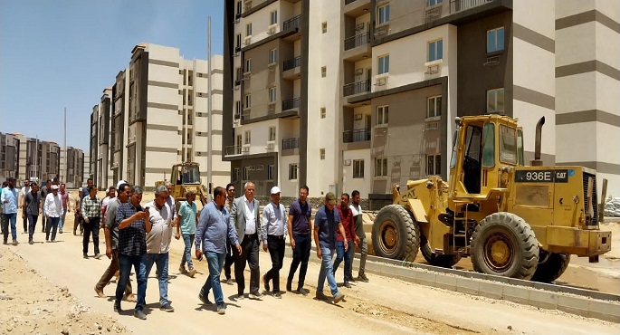 بالصور ..وزير الإسكان يتابع الموقف التنفيذى للمرحلة الثانية بسكن موظفي العاصمة الإدارية الجديدة بمدينة بدر