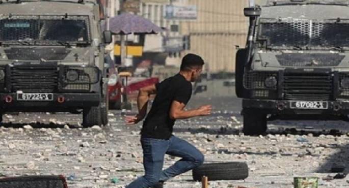 إصابة 4 فلسطينيين برصاص قوات الاحتلال وإحراق 3 منازل ومحل تجاري في مخيم جنين
