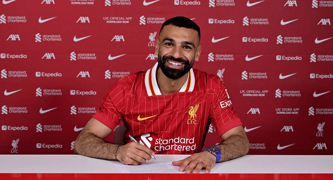 بالصور .. محمد صلاح يمدد عقده رسميا مع ليفربول