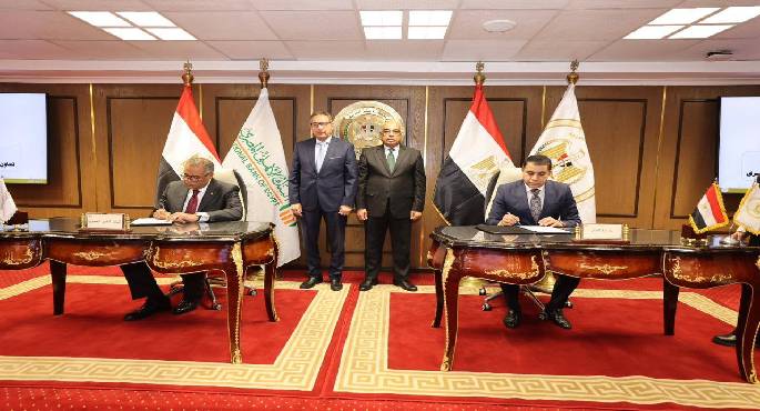 وزير العدل يشهد مراسم توقيع بروتوكول تعاون بين وزارة العدل والبنك الأهلى المصـرى