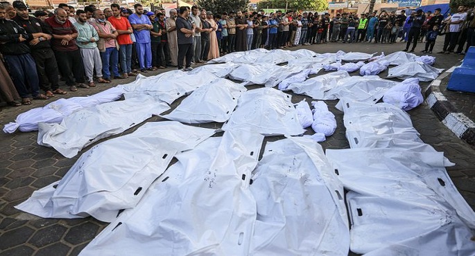 نقل رفات 50 شهيدا من “مقبرة عشوائية” فى مدينة غزة